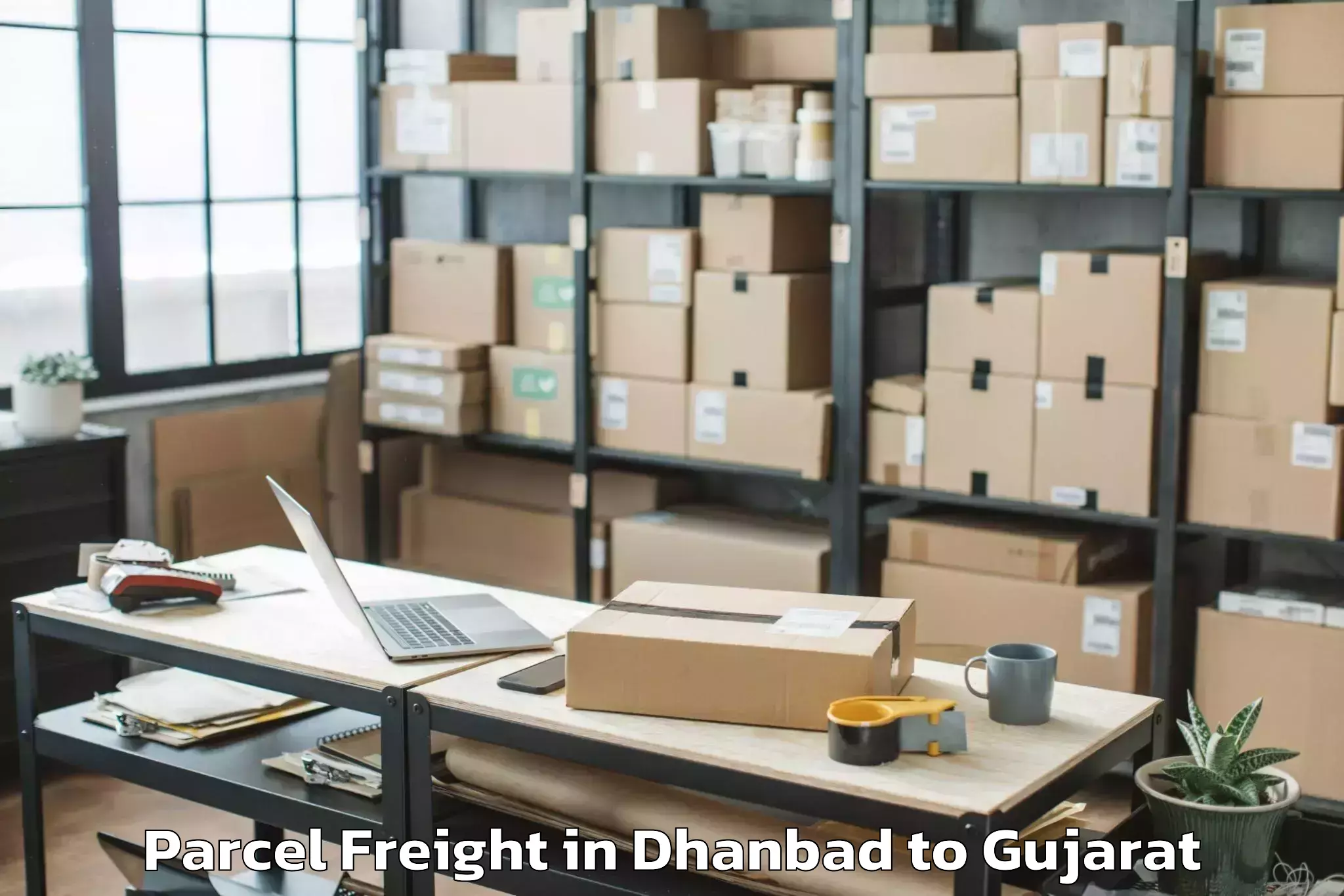 Quality Dhanbad to Halvad Parcel Freight